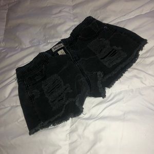 Black ripped shorts
